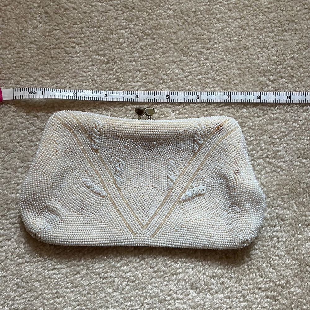 White beaded vintage clutch with some golden beaded accents
